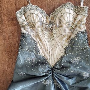 Elegant mothers of bride dress with alot of bead